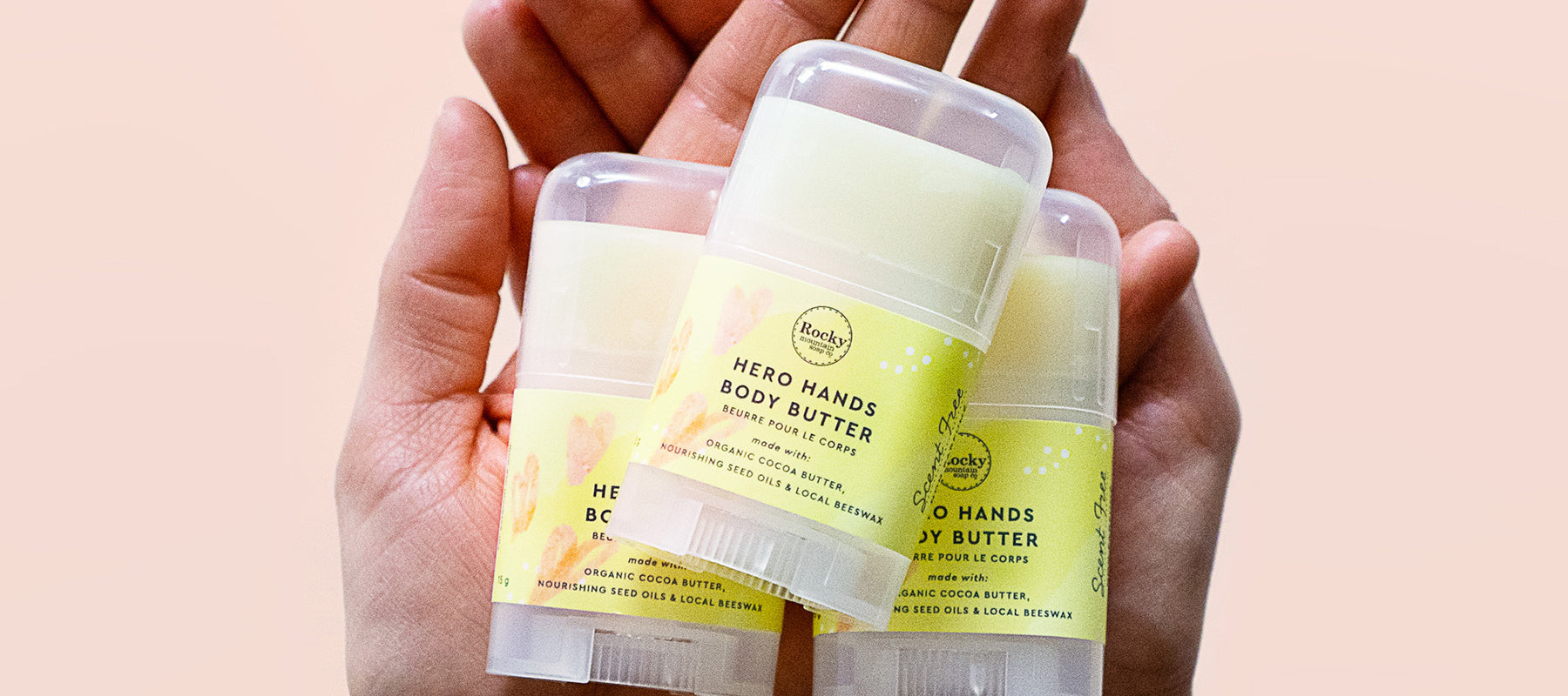 hand holding Hero Hands community dry skin butter donation to Alberta hospitals.